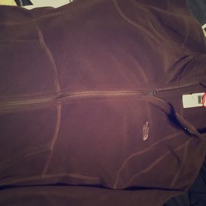 North face medium zip up front jacket.